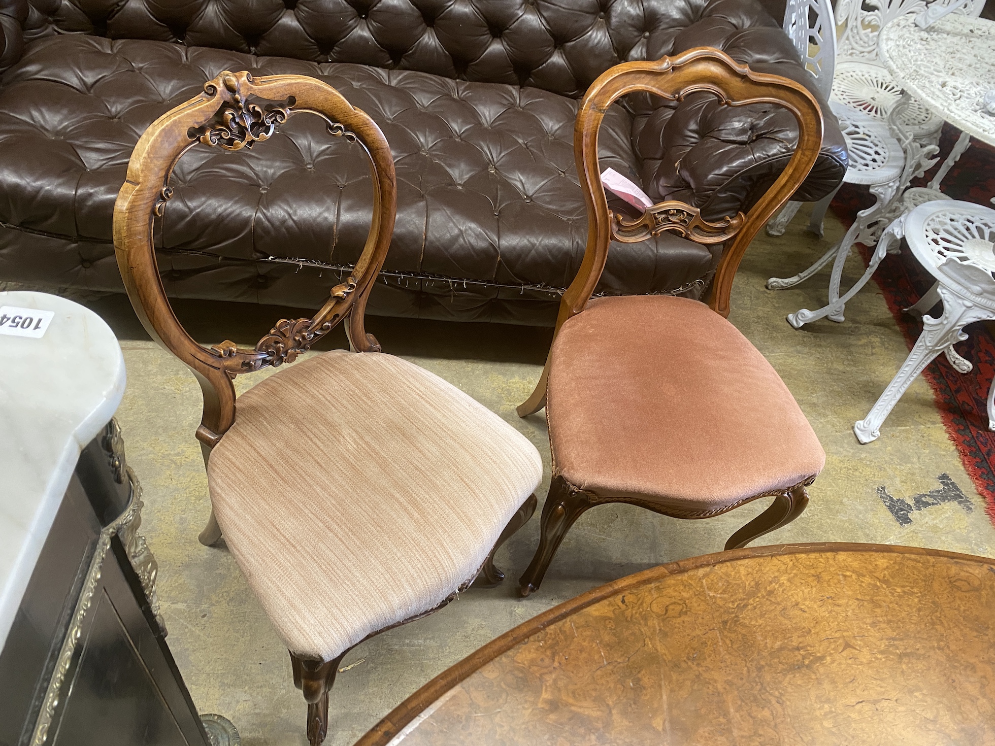 A harlequin set of six (4 plus 2) Victorian walnut dining chairs